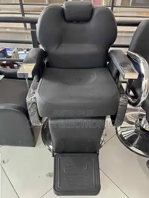 Black Faux Leather Hydraulic Reclining Barber Chair With a Footrest