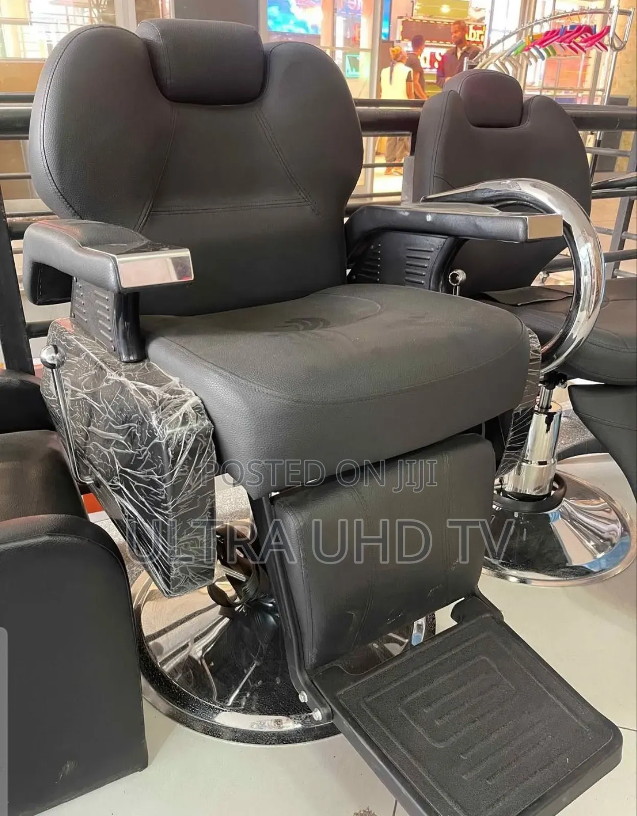 Black Faux Leather Hydraulic Reclining Barber Chair With a Footrest