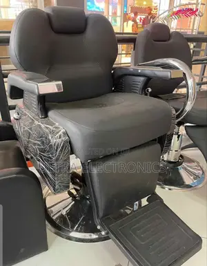Black Faux Leather Hydraulic Reclining Barber Chair With a Footrest