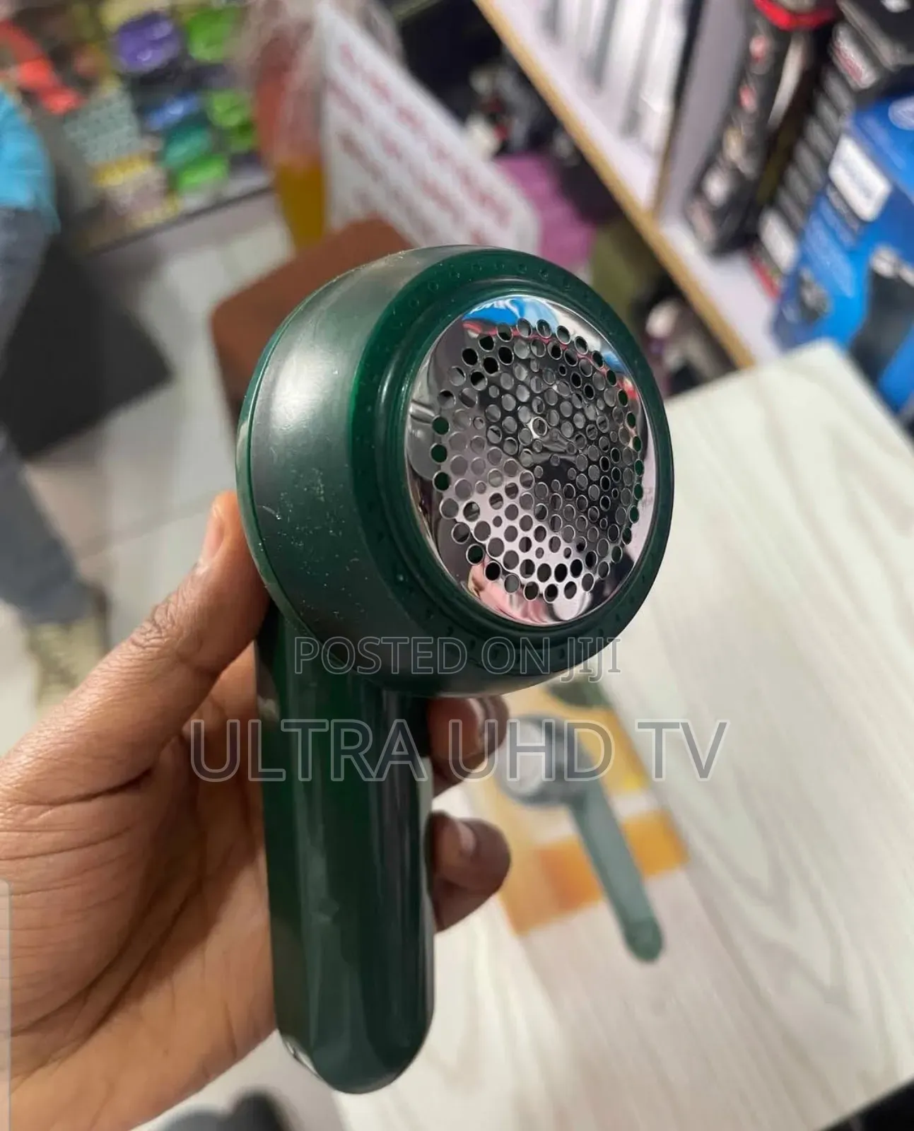 Rechargeable Electric Lint Remover. It Is Designed to Remove