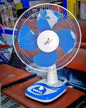 Fan Dixie Ultra Disposable Paper Plate With a "Shape Crown" Design