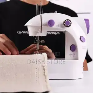 Portable Mini Sewing Machine - Professional Stitches, Small Size!