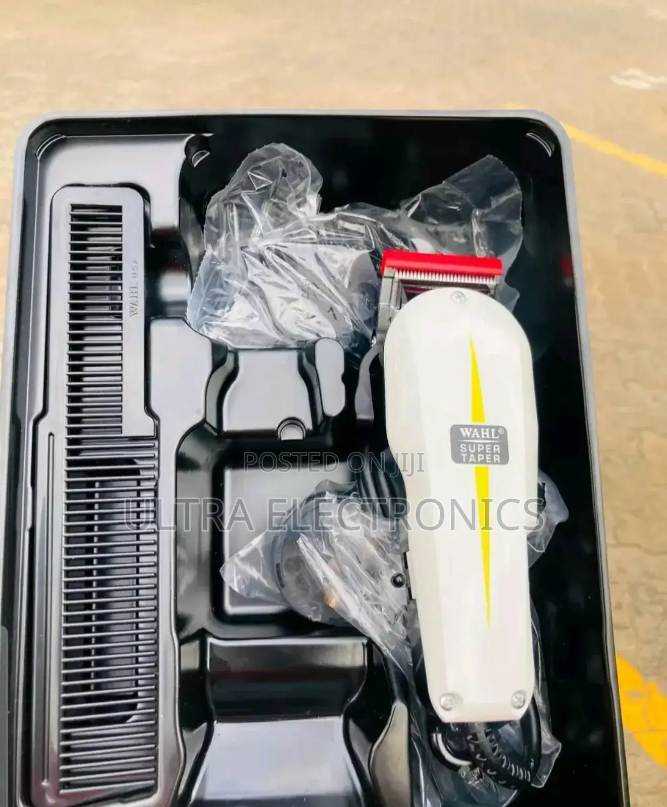 የፀጉር ማሽን Wahl Super Taper Professional Corded Hair Clipper Kit.