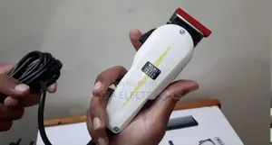 የፀጉር ማሽን Wahl Super Taper Professional Corded Hair Clipper Kit.