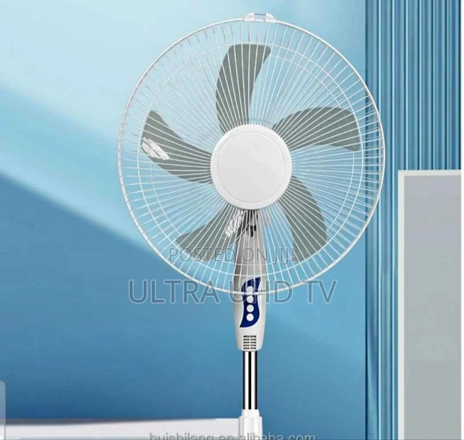 Electric Fan. It Is a Powered Machine That Uses