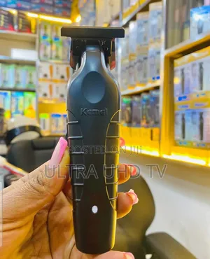 Kemei Km-2299 Professional Cordless Hair Clipper and Beard Trimmer.
