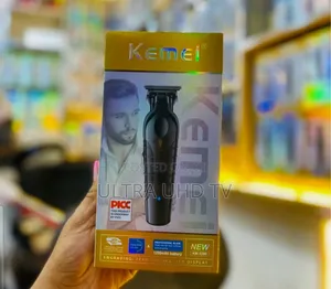 Kemei Km-2299 Professional Cordless Hair Clipper and Beard Trimmer.