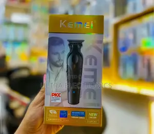 Kemei Km-2299 Professional Cordless Hair Clipper and Beard Trimmer.
