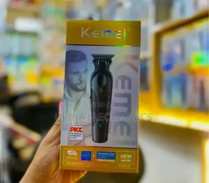 Kemei Km-2299 Professional Cordless Hair Clipper and Beard Trimmer.