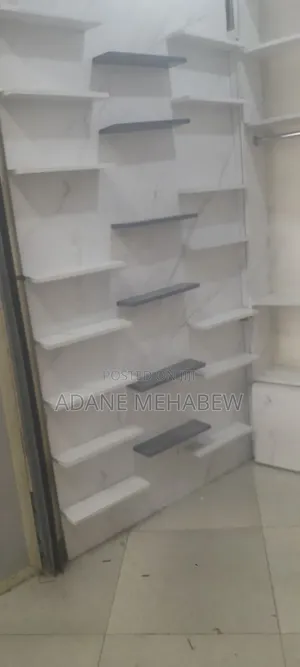 የልብስ መደረርደሪያ ሸልፍ