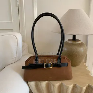 Charles Keith Victoria Belted Elongated Shoulder Bag