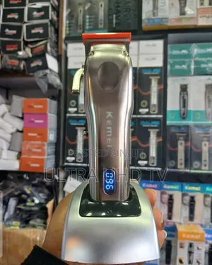 Kemei Km-9360 Electric Hair Clipper With an LCD Display.