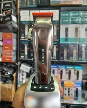 Kemei Km-9360 Electric Hair Clipper With an LCD Display.