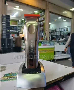 Kemei Km-9360 Electric Hair Clipper With an LCD Display.