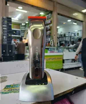 Kemei Km-9360 Electric Hair Clipper With an LCD Display.