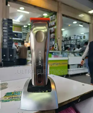 Kemei Km-9360 Electric Hair Clipper With an LCD Display.
