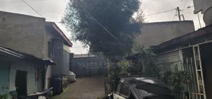 አስፓልት ዳር የሚሸጥ ቤት