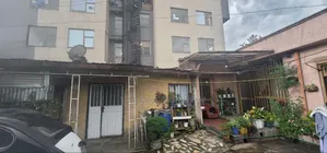 አስፓልት ዳር የሚሸጥ ቤት