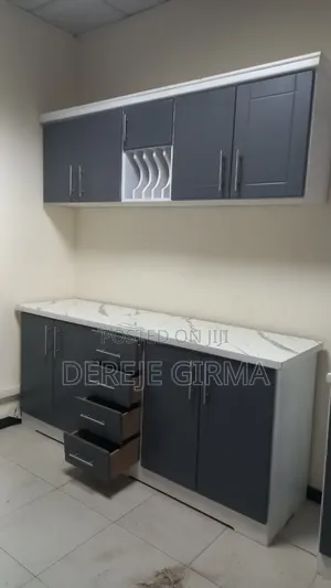 በጥራት በmdf የተሰራ 2ሜትር ኪችን ካብኔት ከነተሰቃዩ