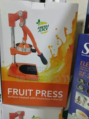 Manual Citrus Juicer Featuring a Lever Pressing Fruits Like Oranges,
