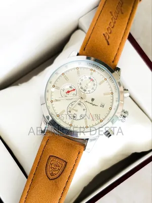 Luxury Wristwatch Features a Leather Band and a Stainless Steel Case