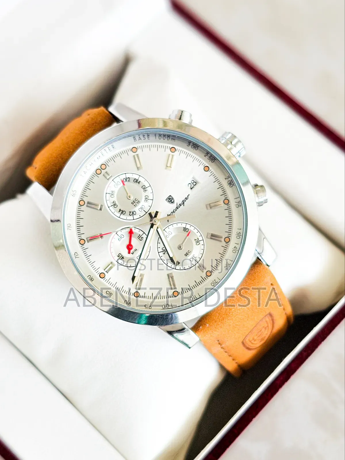 Luxury Wristwatch Features a Leather Band and a Stainless Steel Case