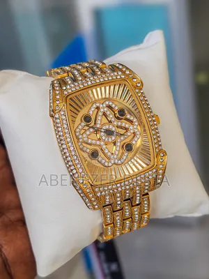 Gold-Tone, Diamond-Encrusted Design With a Tonneau-Shaped Case and Cha