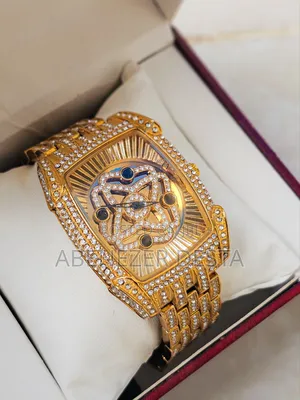 Gold-Tone, Diamond-Encrusted Design With a Tonneau-Shaped Case and Cha