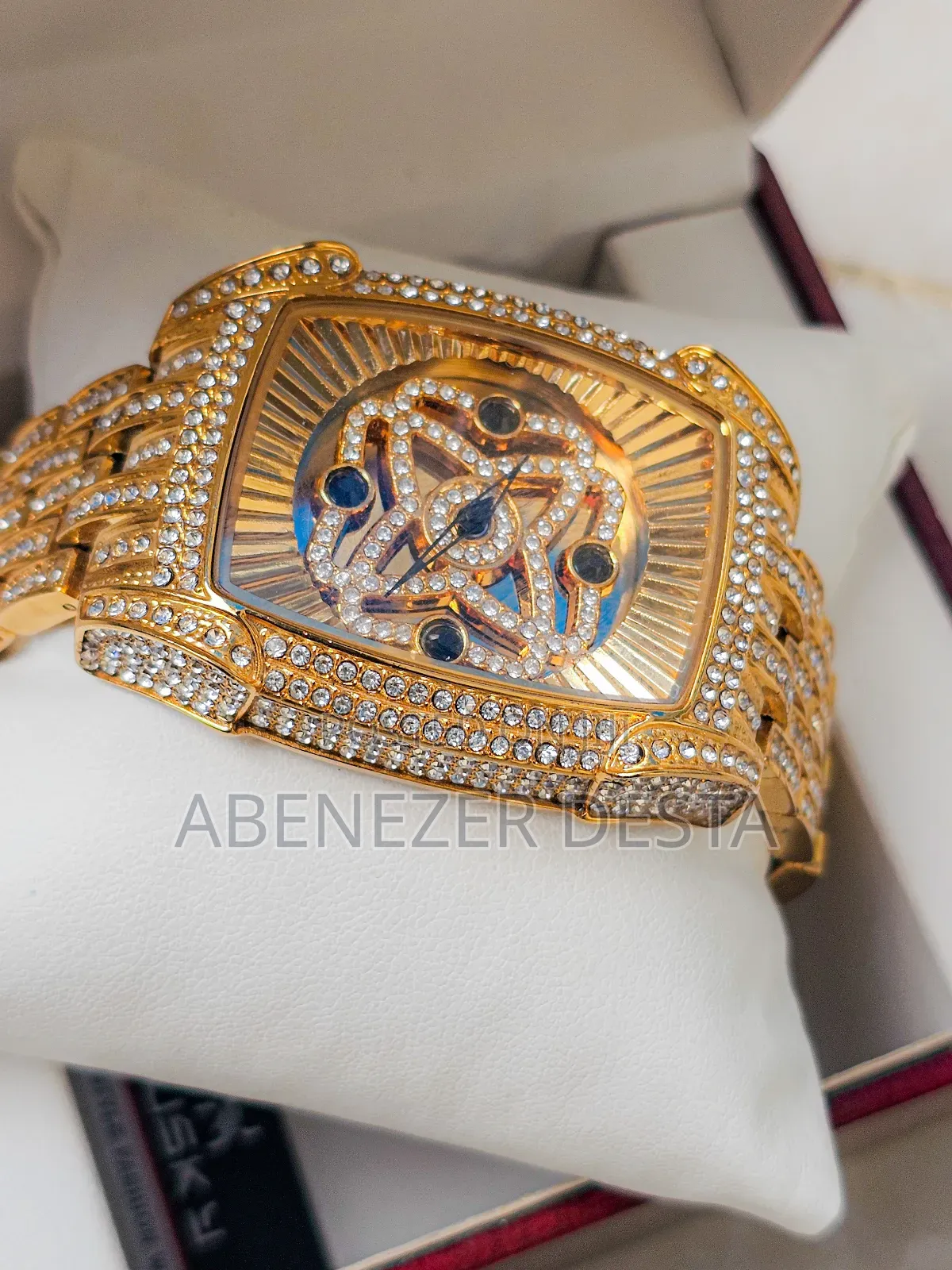 Gold-Tone, Diamond-Encrusted Design With a Tonneau-Shaped Case and Cha