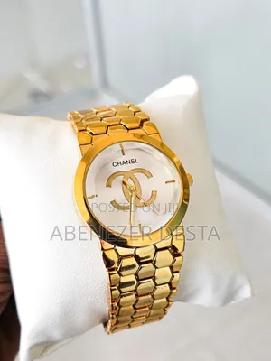 Gold-Tone Wristwatch Features a Chanel Logo on the Dial, A