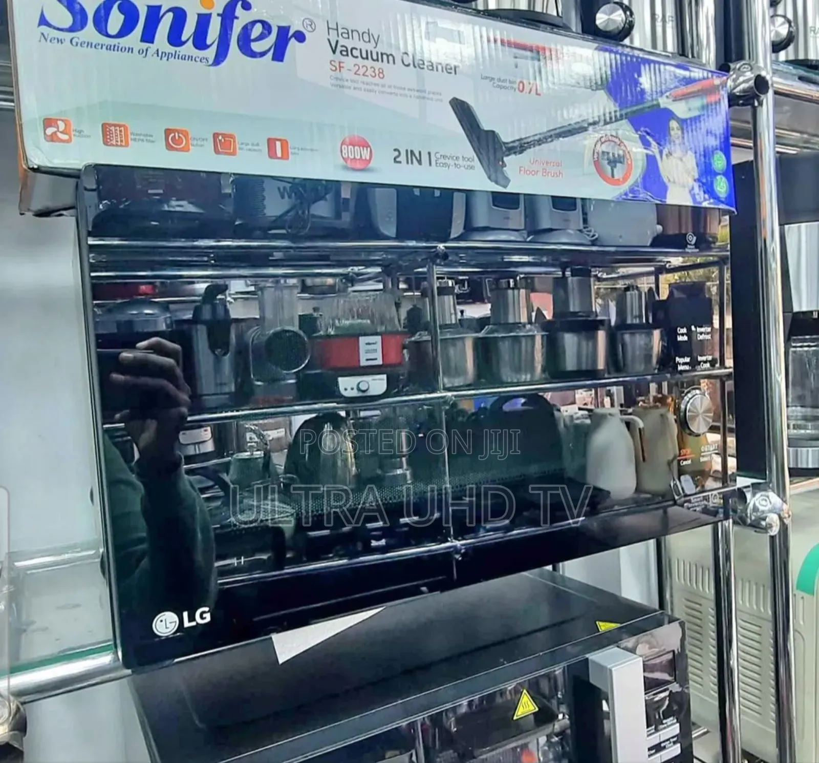 Lg Neochef Microwave Oven Displayed on a Shelf in a Store.