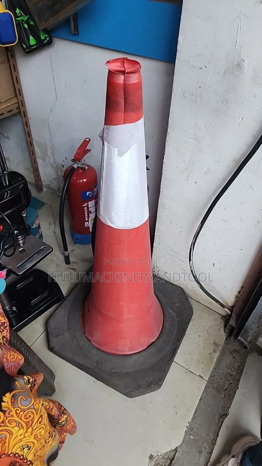 A Red And White Traffic Safety Cone