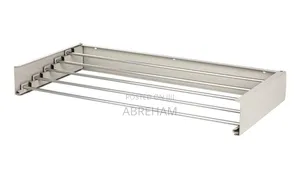 ግድግዳ ላይ የሚታሰር የልብስ ማስጫ Minimalist Wall Mounted Foldable Cloth Rack