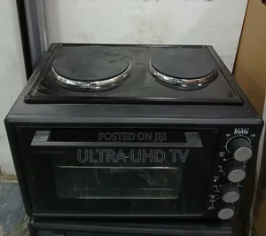 Delta Europe Brand Electric Mini Oven With Dual Hot Plates on Top.
