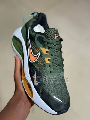 Nike Zoom Max Sneaker in an Army Green Color Variant