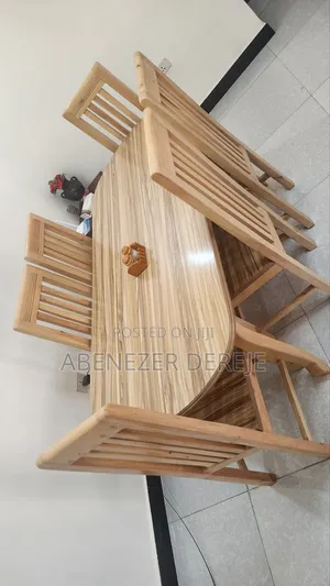 Dining Table የመመገቢያ ጠረቤዛ