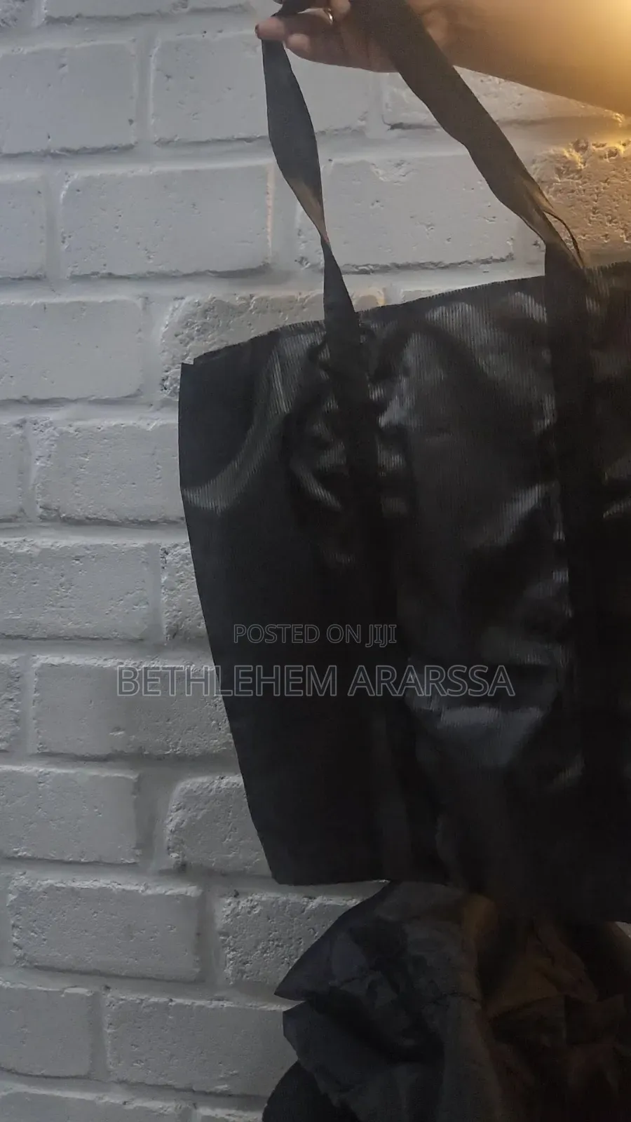 Foldable Shopping Bag(ተጣጣፊ እቃ መያዣ)