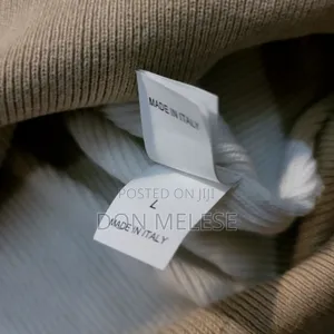 Brunello Cucinelli Striped Rib-Knit Polo: Timeless Breton Elegance