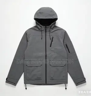 The Main Body of the Jacket Is a Muted Grey or Light Green Color.