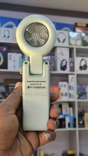 Portable Mini Fan – Handheld Rechargeable Cooling Fan