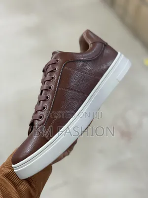 Rova Brown Pebbled Leather Sneakers: One Step Ahead