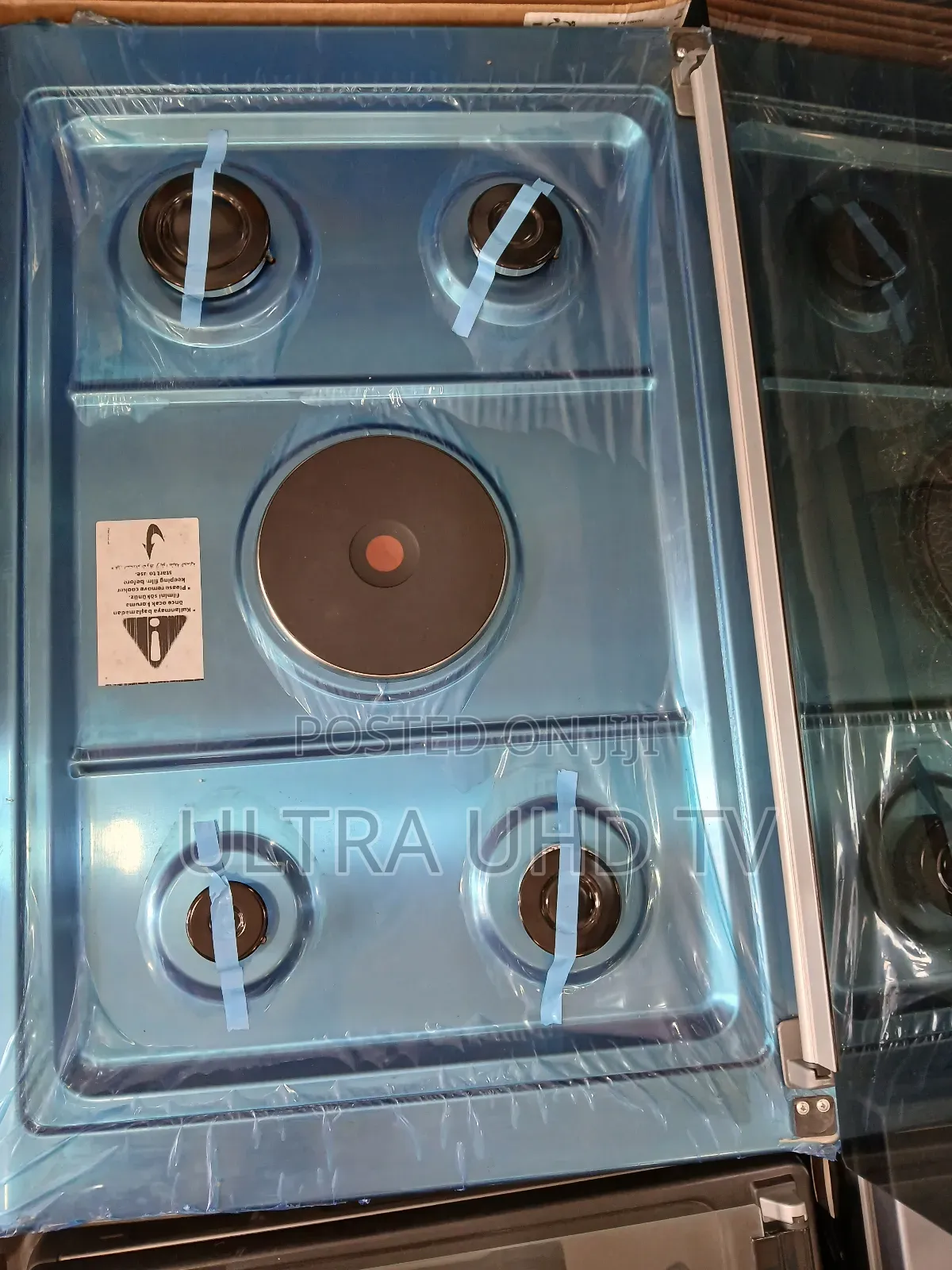 Kumtel Freestanding Cooker, Likely Featuring 1 Electric 4 Gas Burners