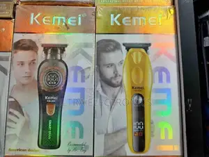 Kemei Brand Electric Hair Trimmers in Their Packaging.