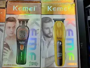 Kemei Brand Electric Hair Trimmers in Their Packaging.