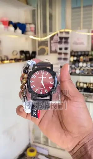 Analog Quartz Watch With a Beaded Bracelet Accessory.