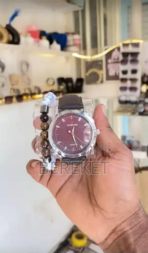 Analog Quartz Watch With a Beaded Bracelet Accessory.