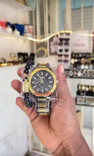 Analog Quartz Watch With a Beaded Bracelet Accessory.