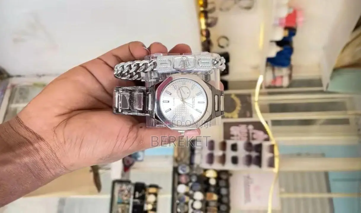 Analog Quartz Watch With a Beaded Bracelet Accessory.