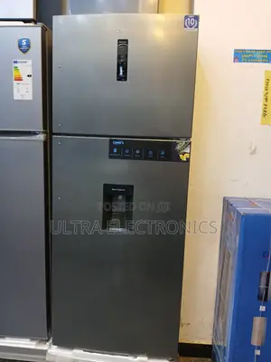 Orbit Top-Freezer Refrigerator, Specifically a 615-Liter Model