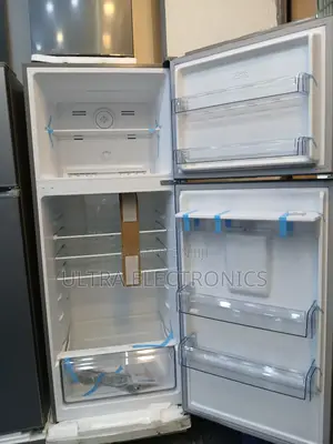 Orbit Top-Freezer Refrigerator, Specifically a 615-Liter Model